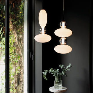 Ideal Lux Lumiere pendant lights installed in modern interior styled as bedside and dining lighting