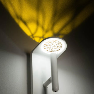 2Nights W2 wall light producing an umber patterned uplight