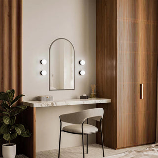 Multiple Orb Deco Wall Lights installed around decorative mirror in luxury interior