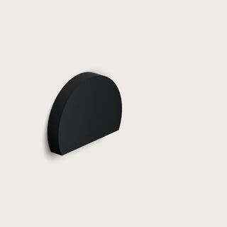 Nola Surface Mounted Step Wall Light by Unios in Black finish