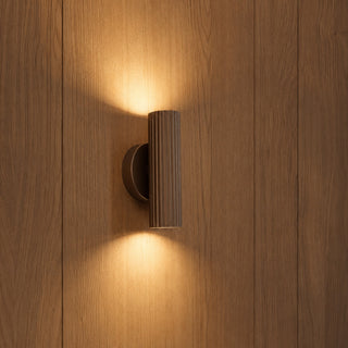 Eglo PORTILLO bronze up and down indoor wall light installed on a timber wall